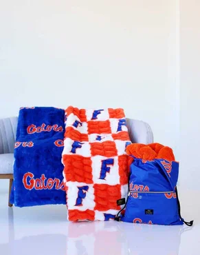 Buy Florida Gators Hugs Blanket Online | Ultra Soft Plush NCAA Throw Blanket for Fans